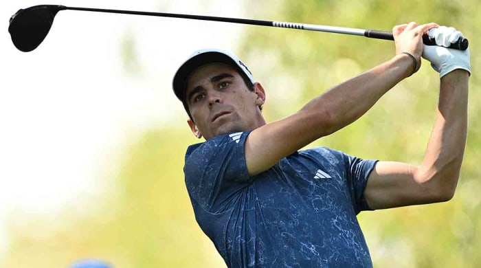 Joaquin Niemann tees off during the 2023 LIV Golf Chicago golf tournament at Rich Harvest Farms.